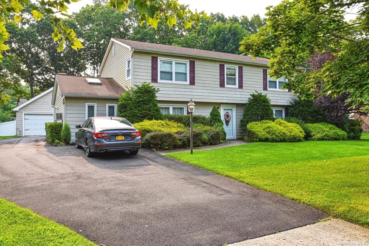 Property Photo:  77 Strathmore Village Drive  NY 11720 