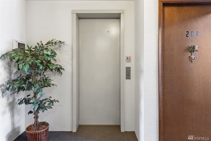 Property Photo:  2031 NW 59th St 202  WA 98107 