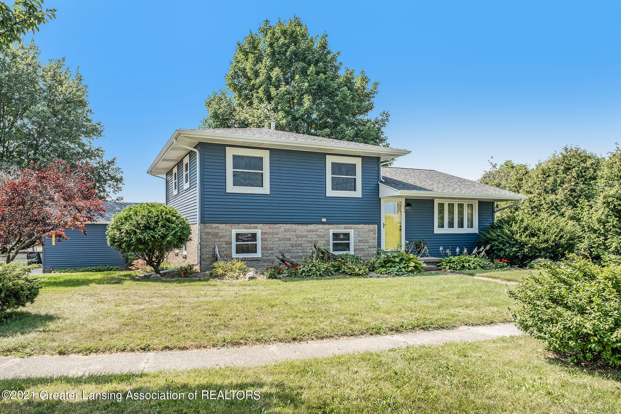 Property Photo:  849 Eugenia Drive  MI 48854 