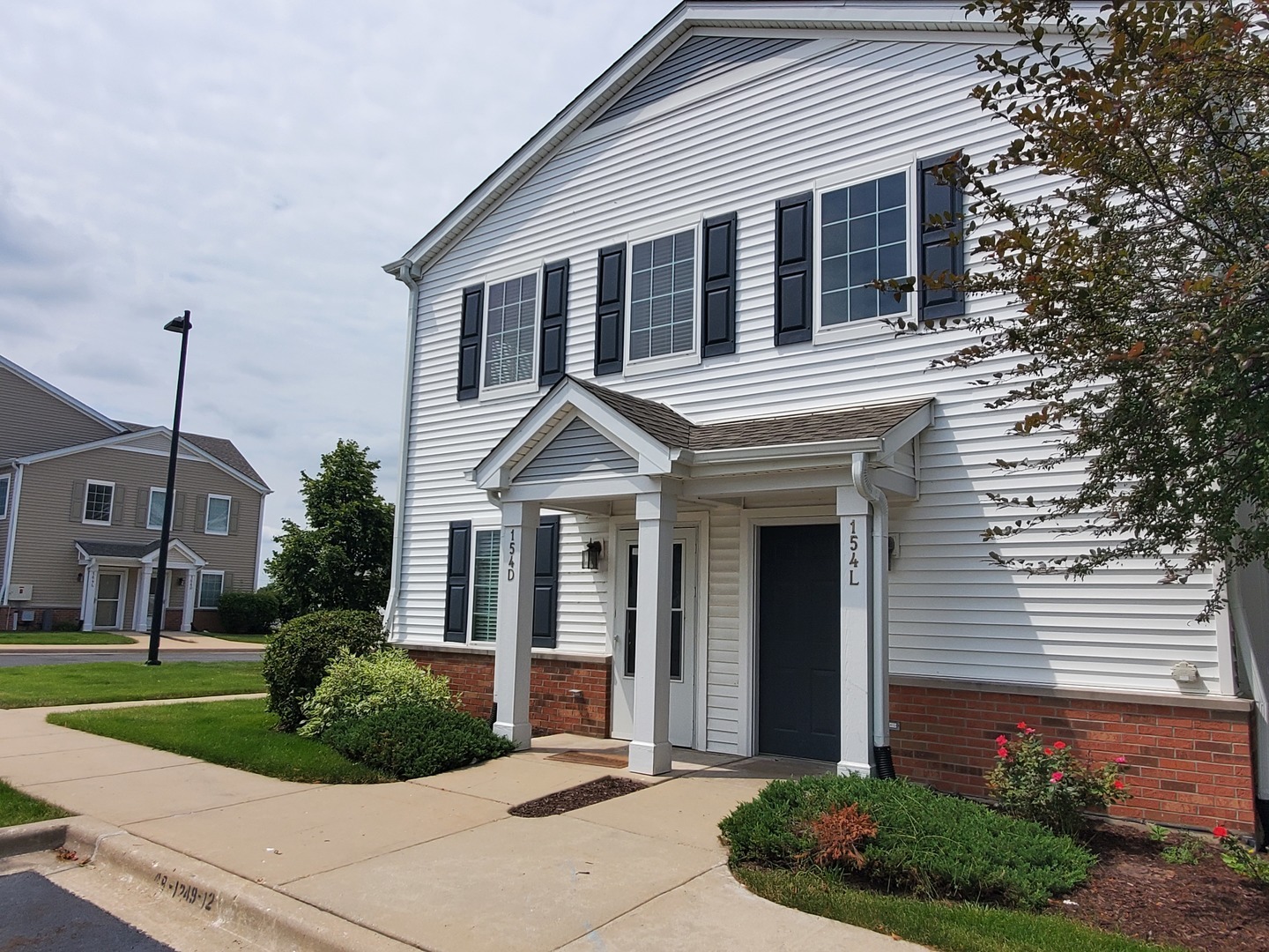 Property Photo: 154 Bertram Drive D IL 60560