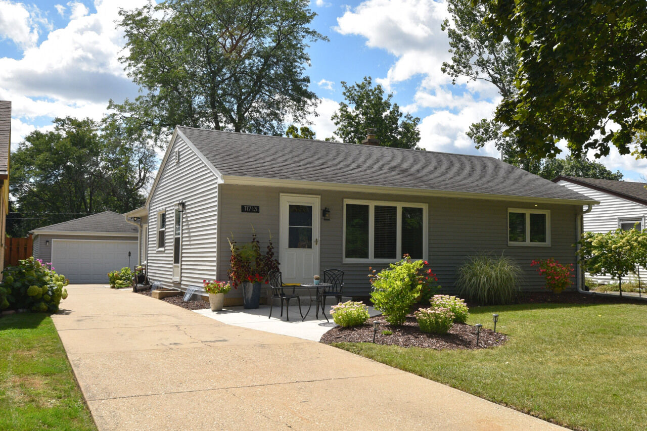 Property Photo:  11713 W Oxford Pl  WI 53226 