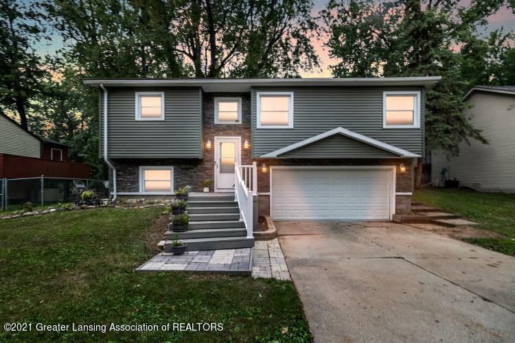 Property Photo:  3712 Stoneleigh Drive  MI 48910 