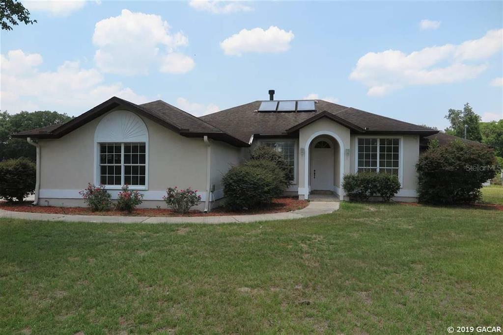 Property Photo:  24208 NW 78th Avenue  FL 32615 