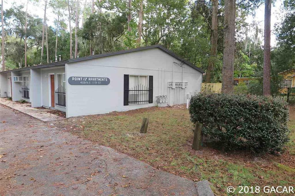 Property Photo:  409 NE 11th Street 1-14  FL 32601 