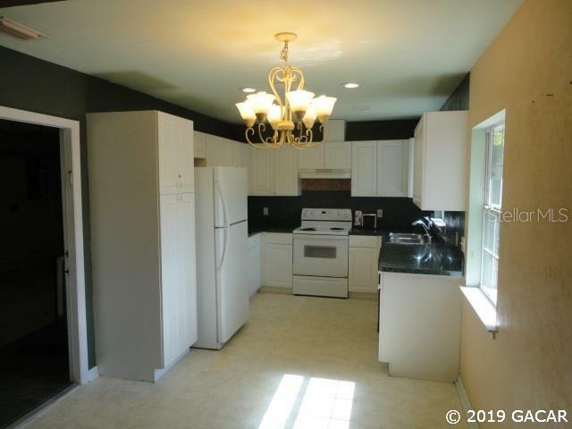 Property Photo:  717 NW 29th Place  FL 32609 