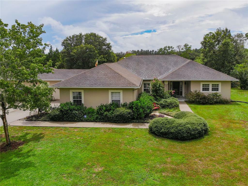 Property Photo:  25449 Rolling Oak Road  FL 32776 