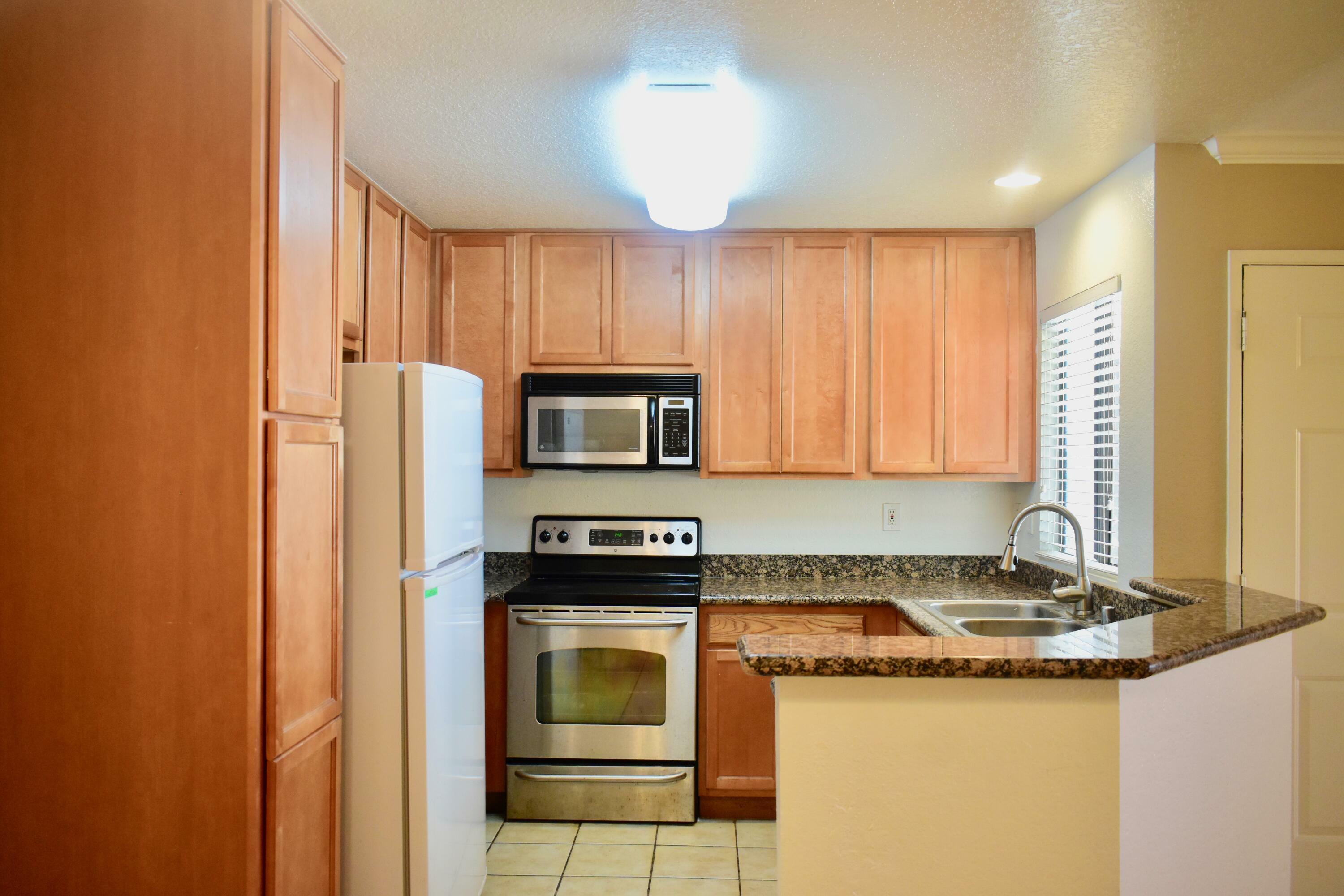 Property Photo:  78650 Ave 42 1809  CA 92203 