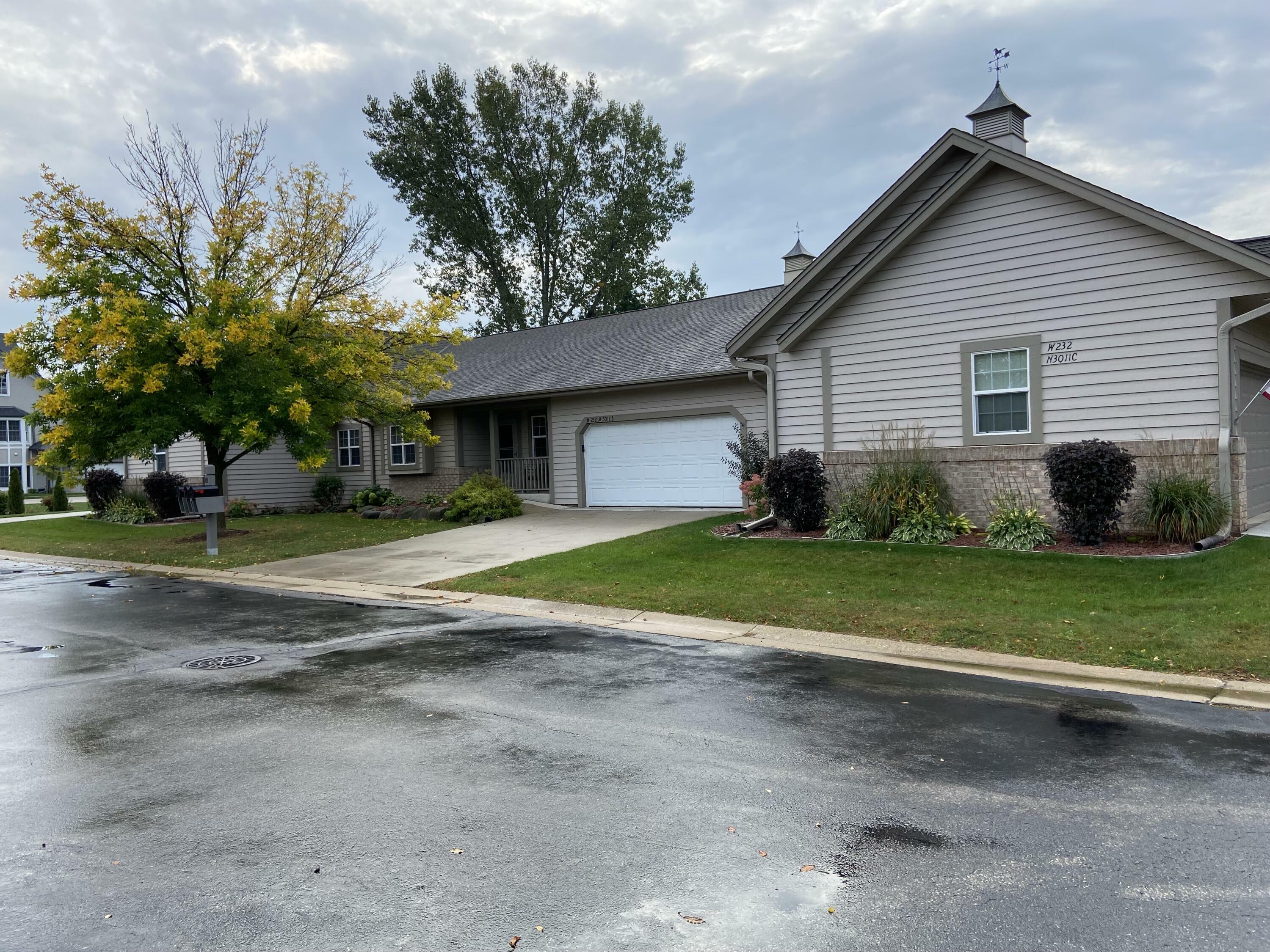 Property Photo: W232n3011 Emerald Ln B WI 53072