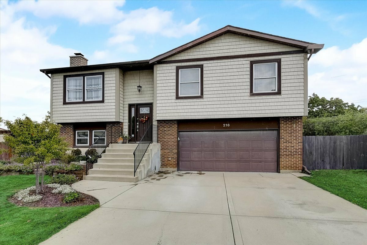 Property Photo: 216 Carriage Drive IL 60188