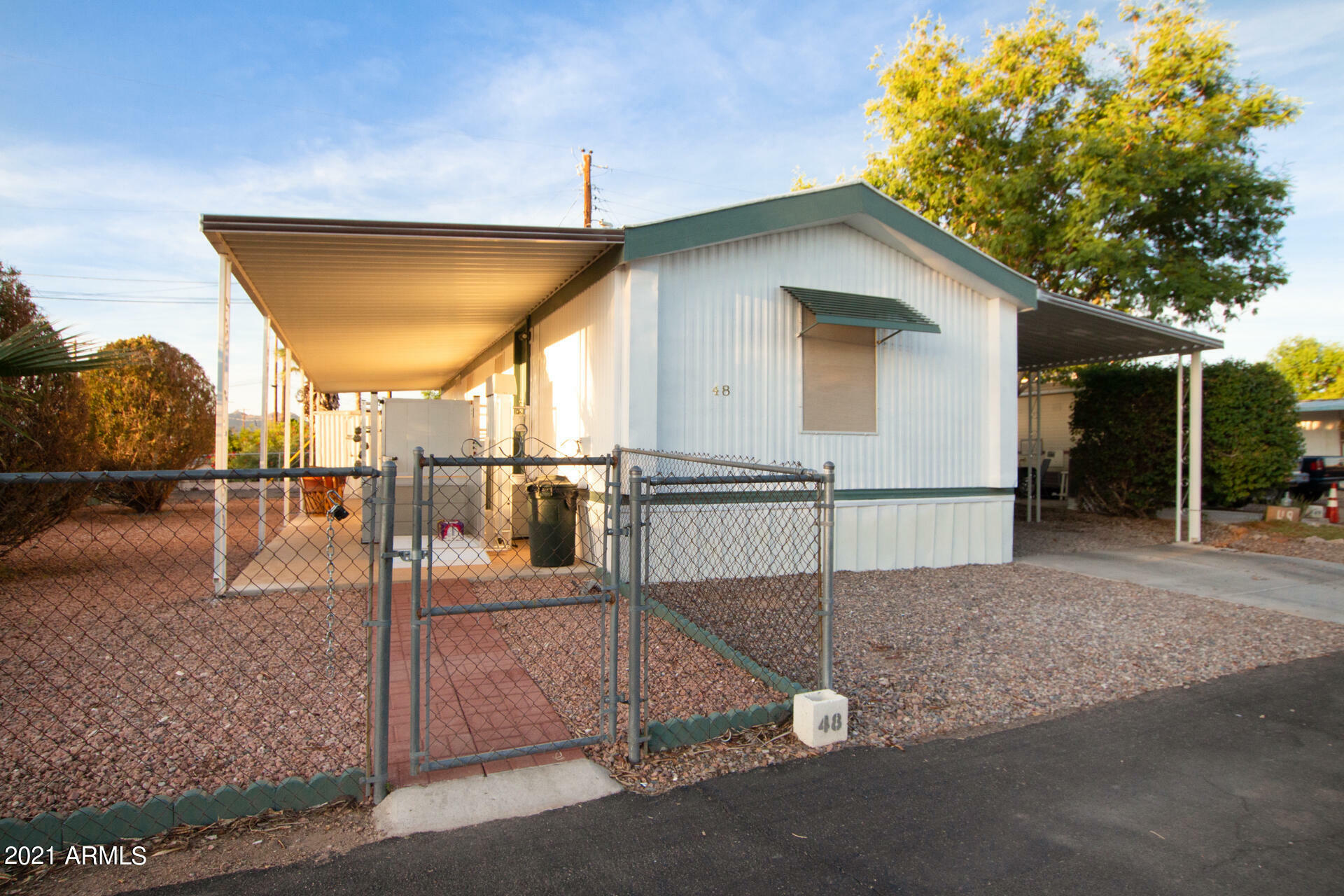 Property Photo:  105 N Delaware Drive 48  AZ 85120 