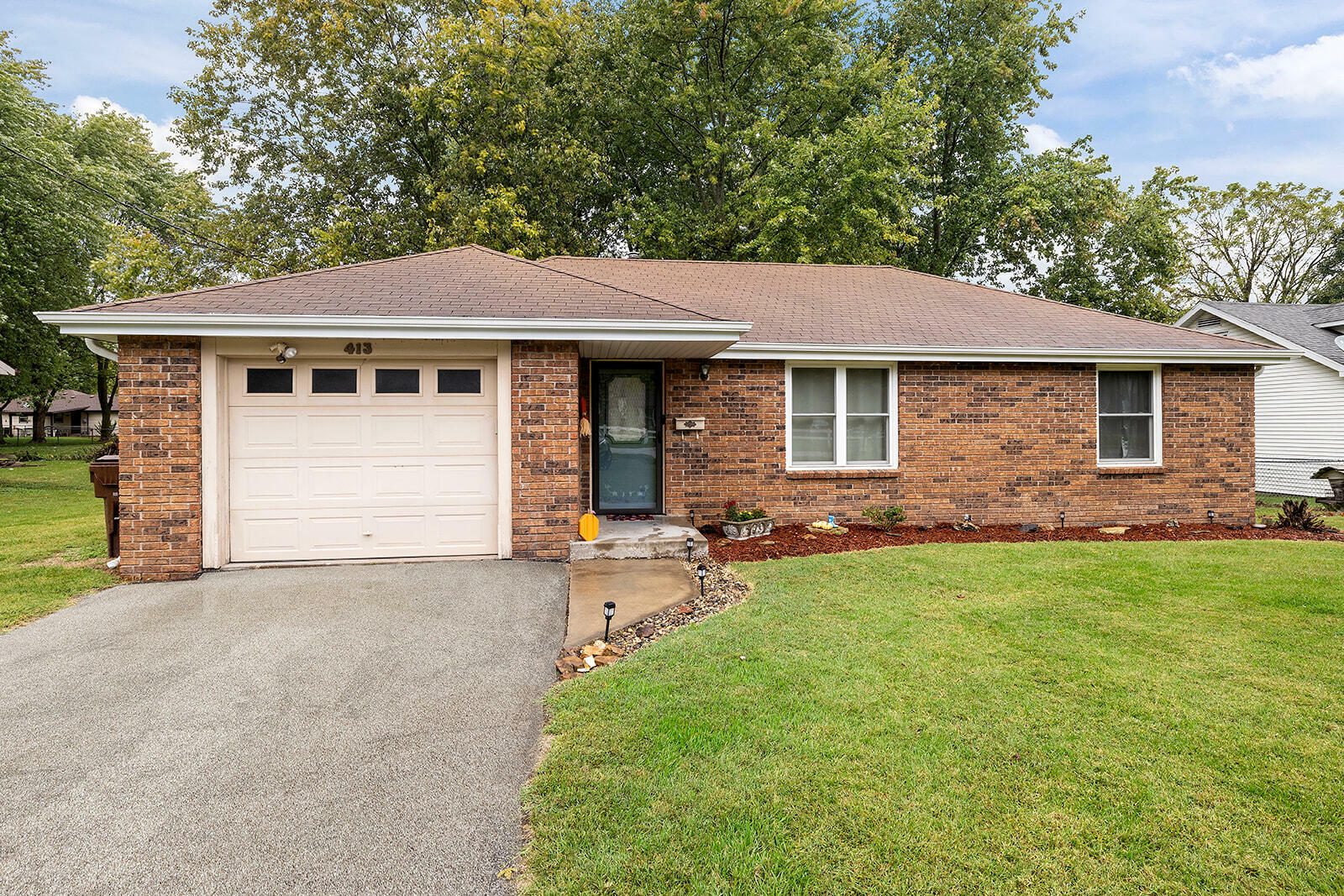Property Photo: 413 W Elm Street MO 65738