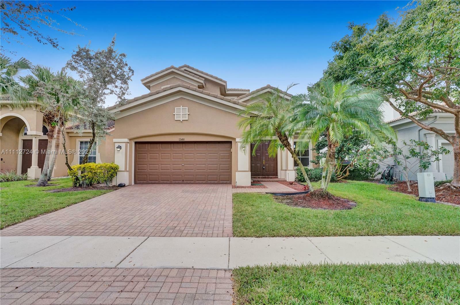 Property Photo:  12480 NW 78th Mnr  FL 33076 