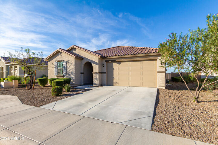 Property Photo: 18132 W Thistle Landing Drive AZ 85338