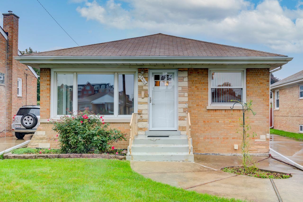 Property Photo: 7416 W Strong Street IL 60706