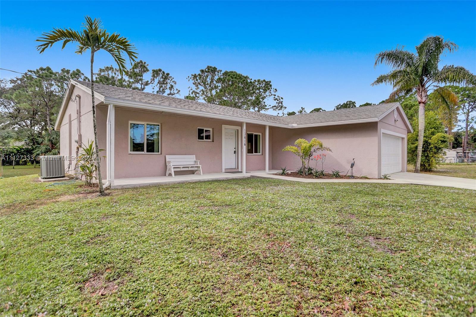 Property Photo: 13616 N 58th Ct N FL 33411