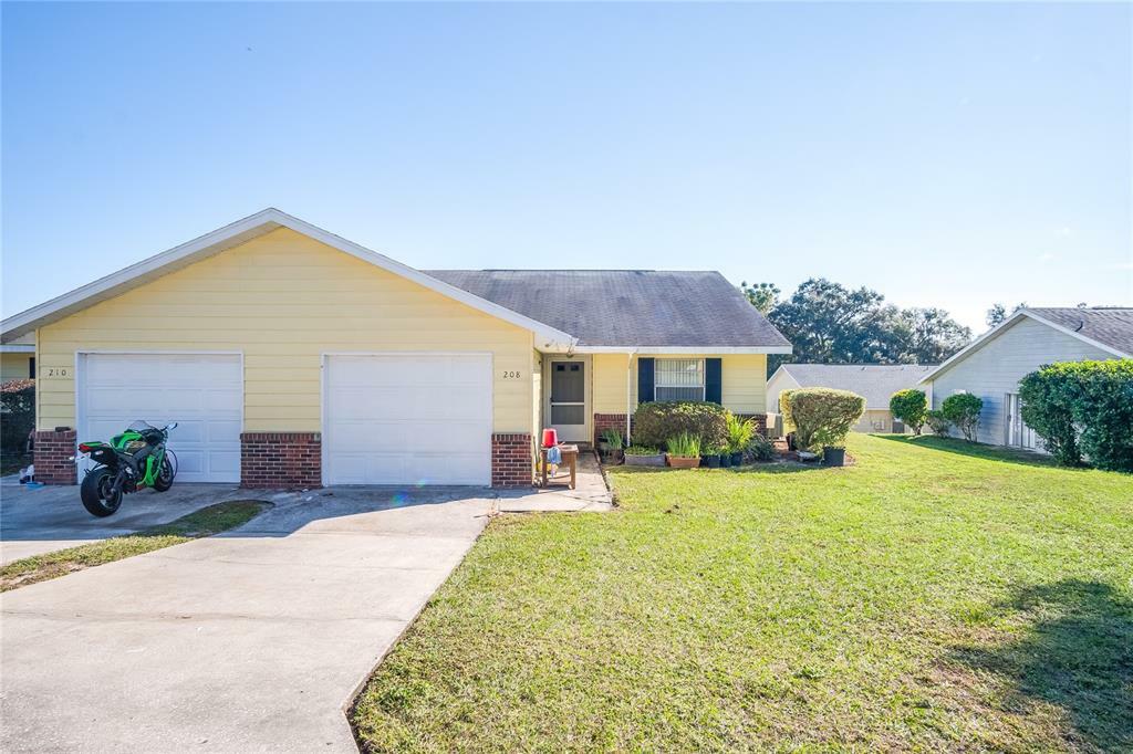 Property Photo:  208 Fernwood Street  FL 34748 