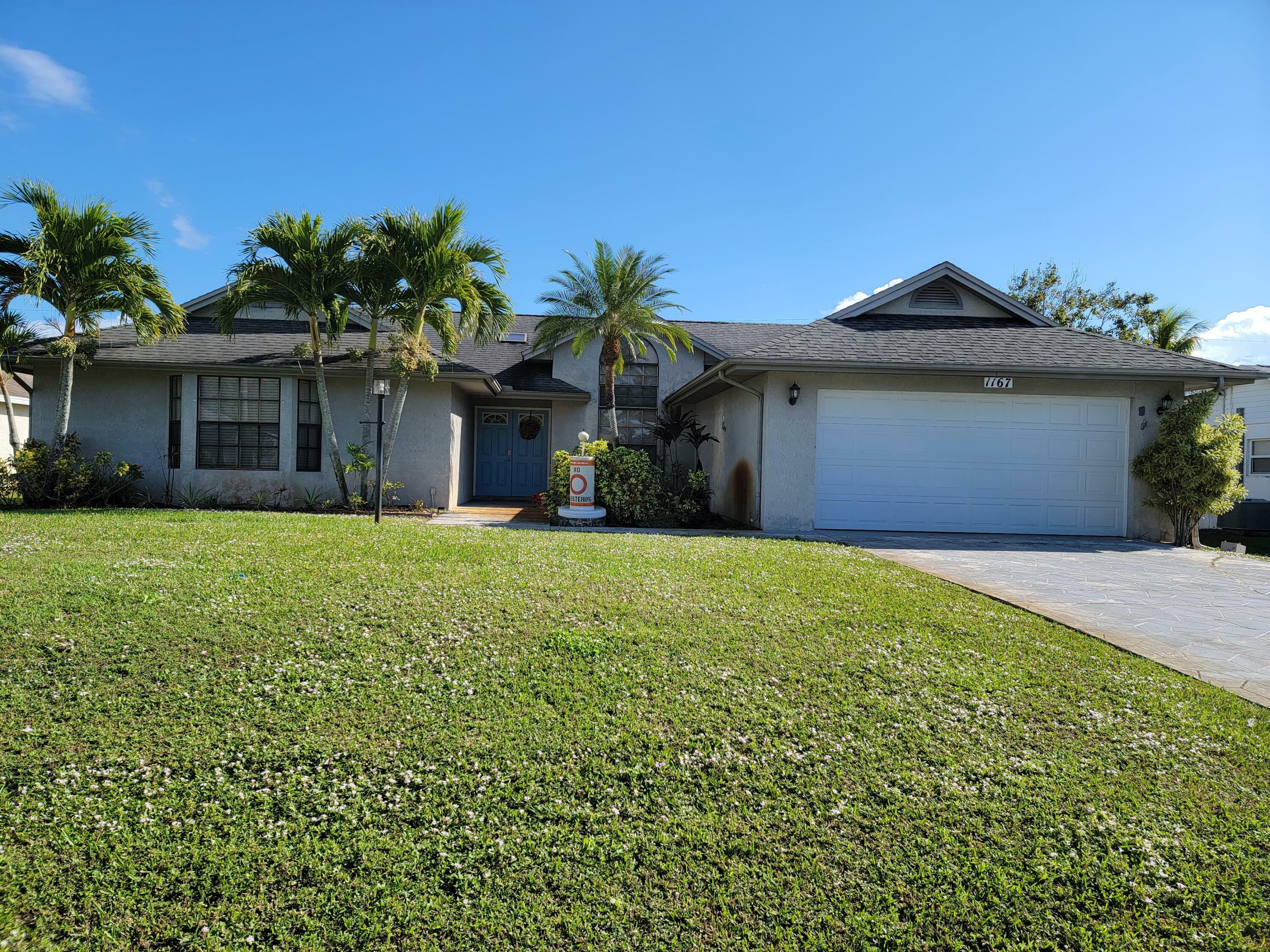 Property Photo: 1167 SW Ithaca Street FL 34983