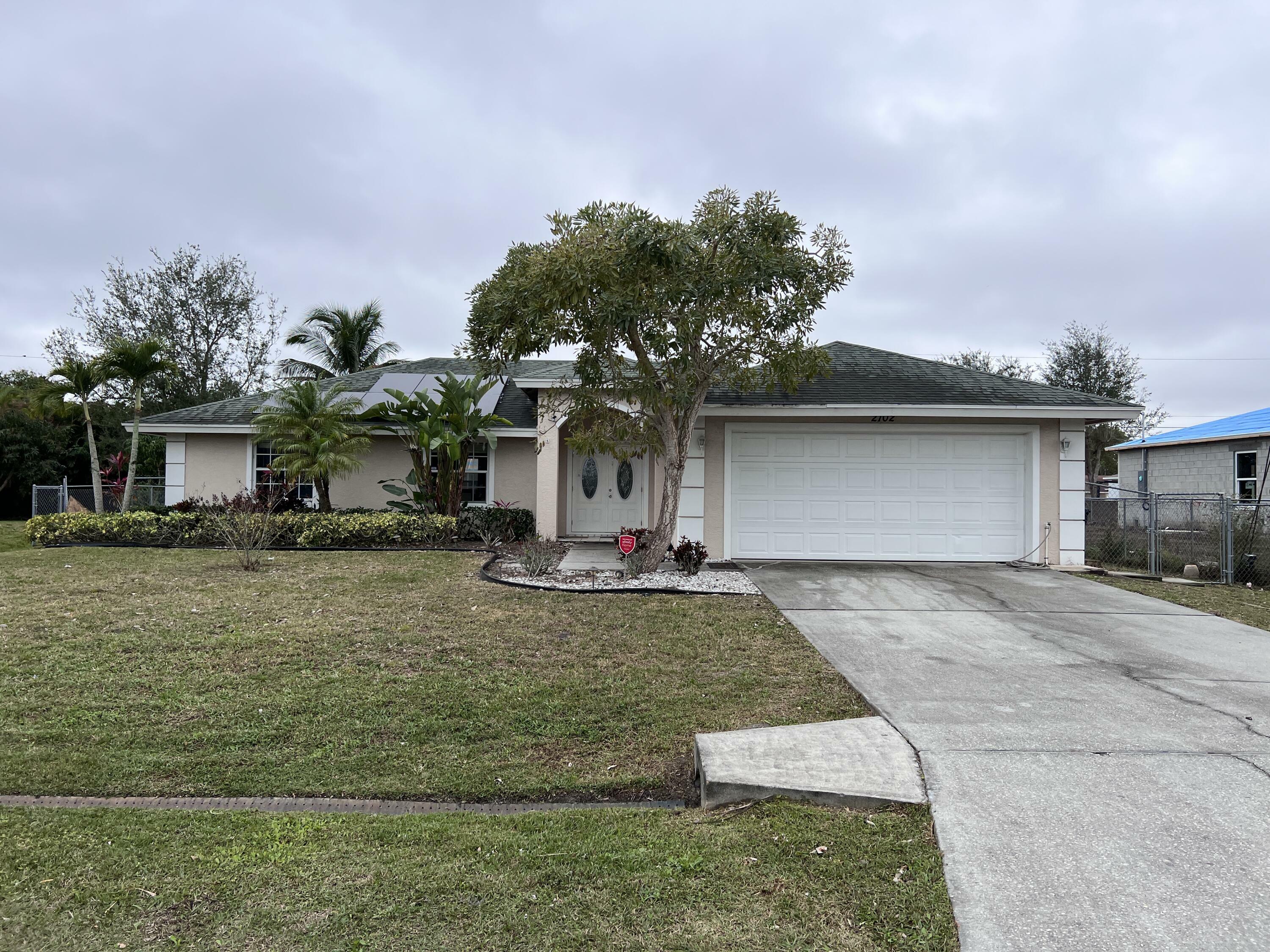 Property Photo: 2102 SW Burlington Street FL 34984
