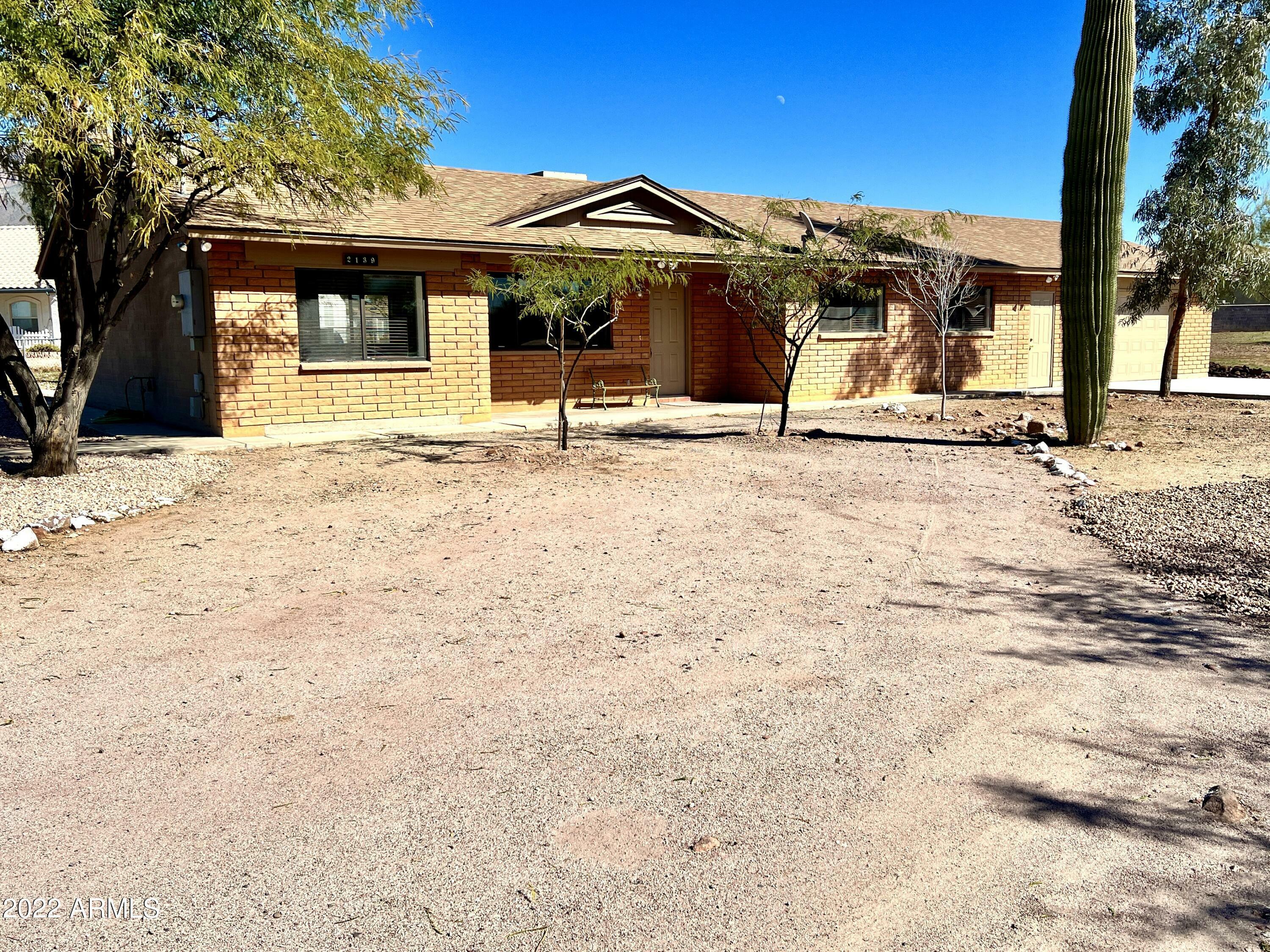 Property Photo:  2139 S Sixshooter Road  AZ 85119 