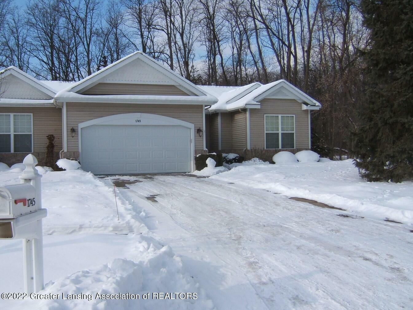 Property Photo:  1745 S Crystal Cove  MI 48840 