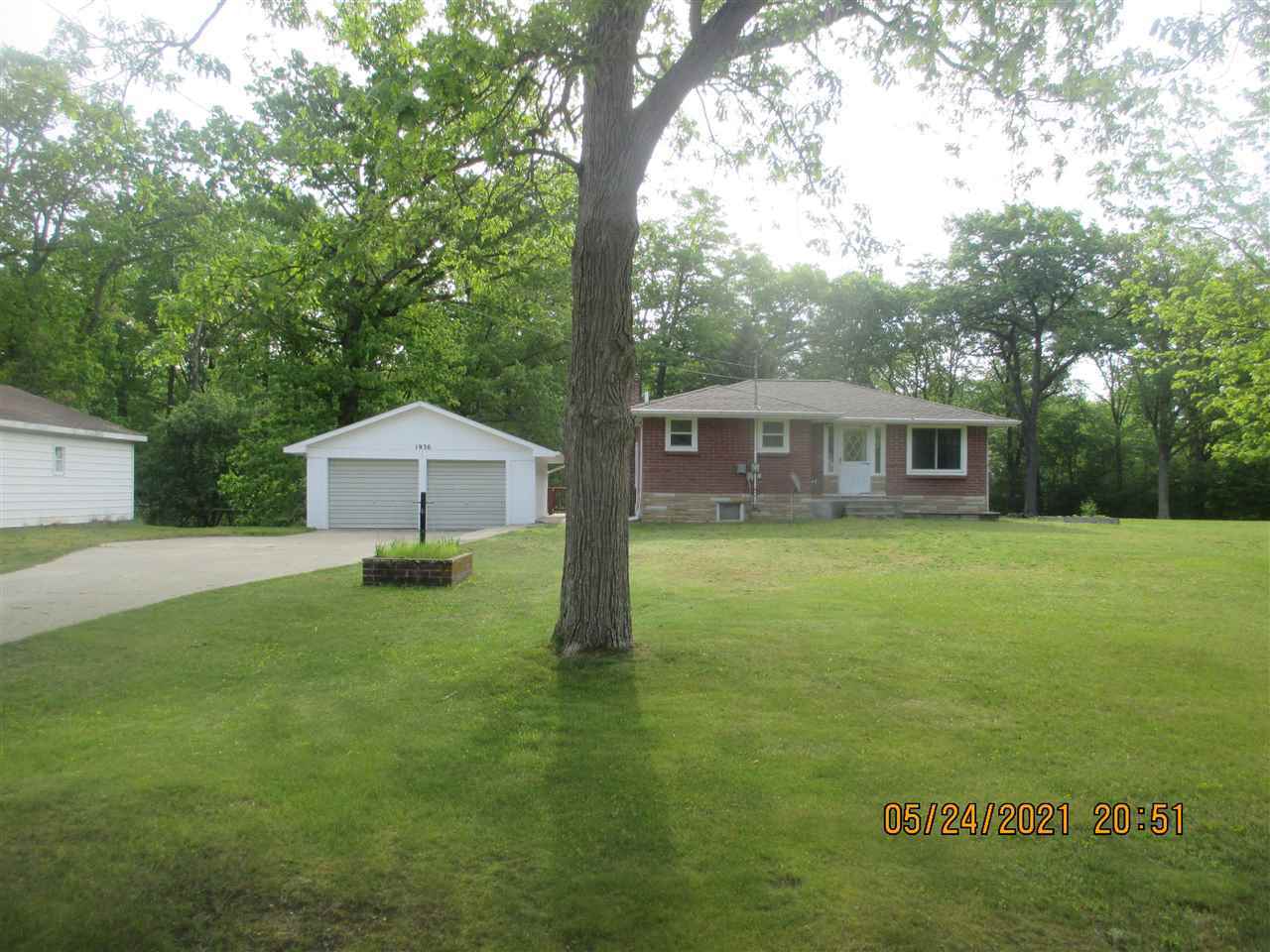 Property Photo:  1936 N Seven Mile  MI 48657 