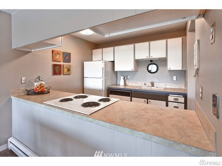 Property Photo:  3601 24th Avenue W 402  WA 98199 