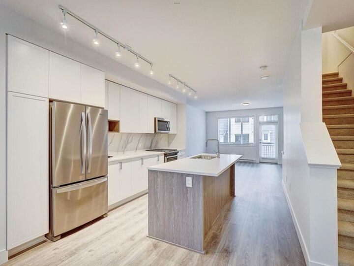Property Photo: 9718 161A Street 109 BC V4N 6S7