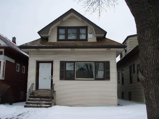 Property Photo:  5242 W Warner Avenue  IL 60641 