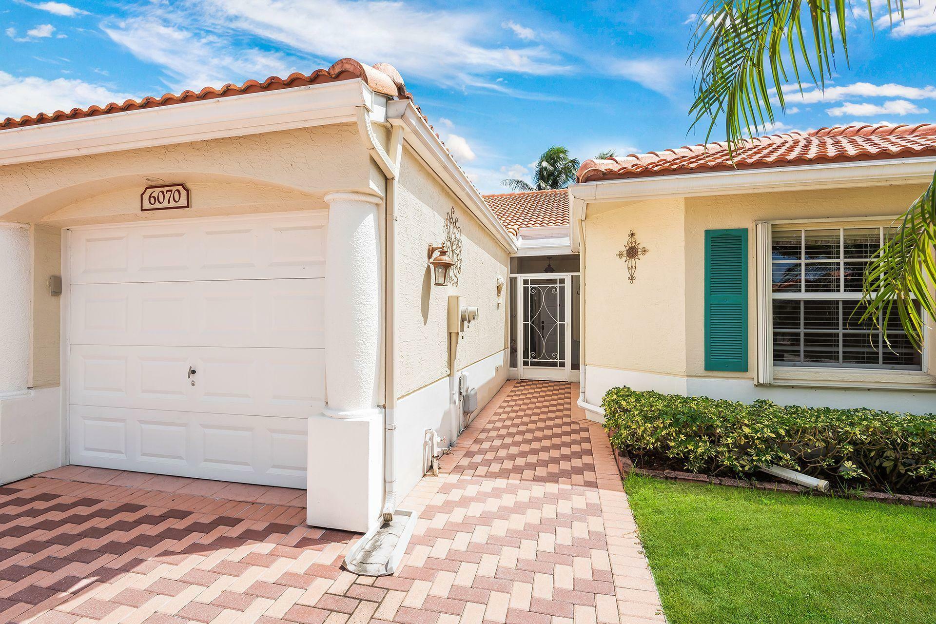 Property Photo: 6070 Lake Hibiscus Drive 6070 FL 33484