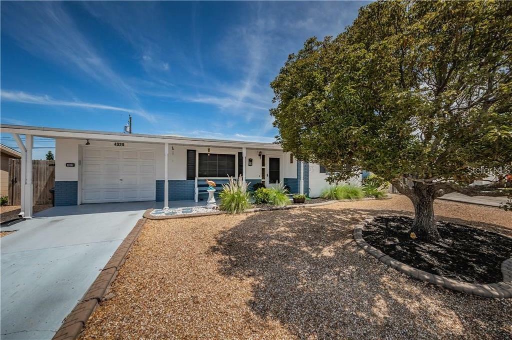Property Photo: 4929 Phoenix Avenue FL 34690