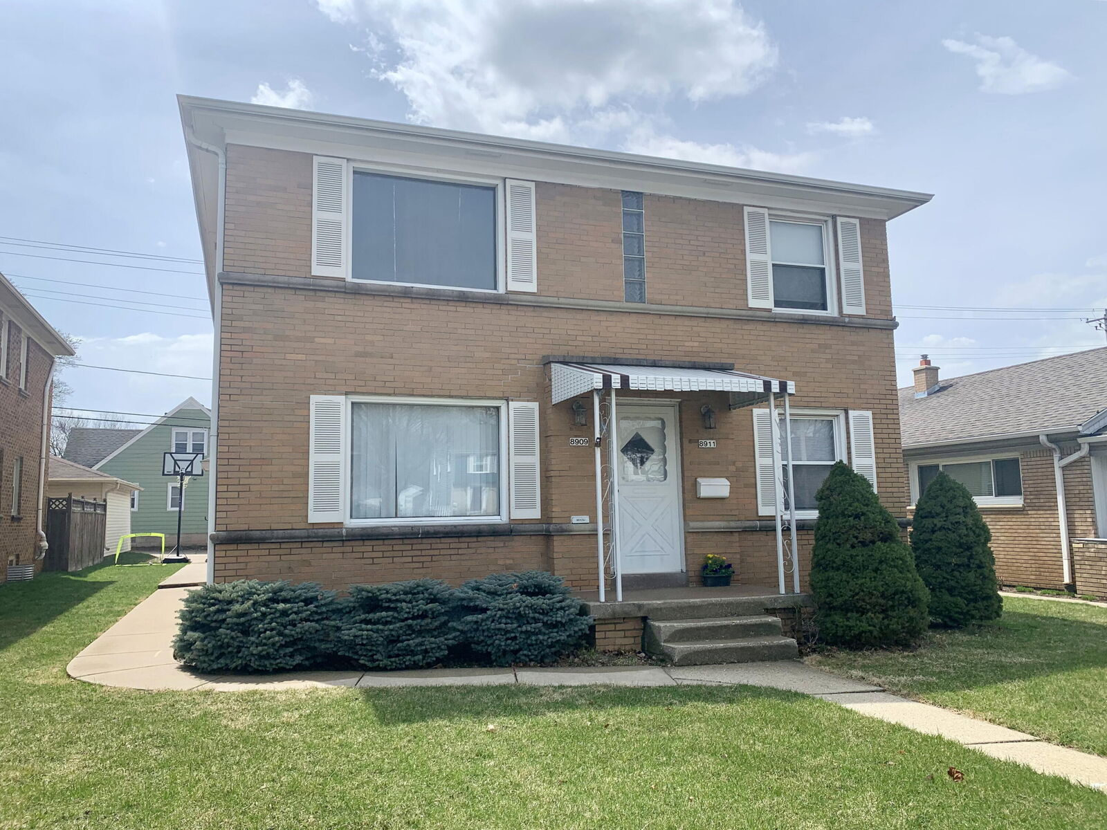Property Photo: 8909 W Burleigh St WI 53222