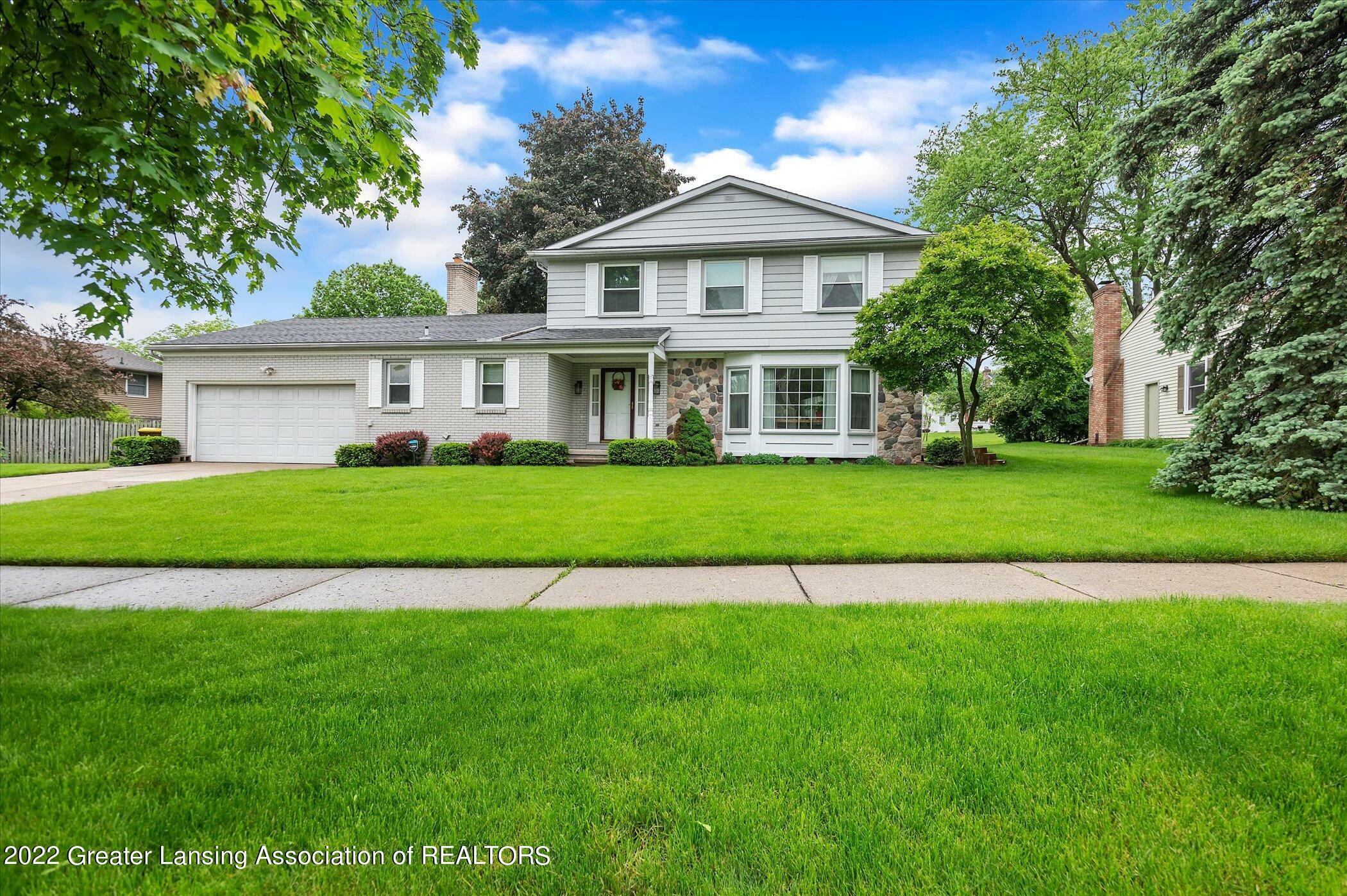 Property Photo:  5891 Shadow Lawn Drive  MI 48823 