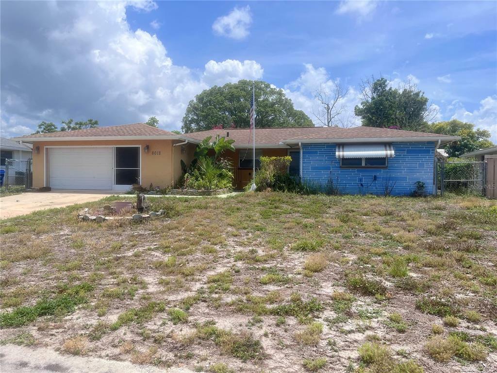 Property Photo: 8012 Mimosa Drive FL 34668
