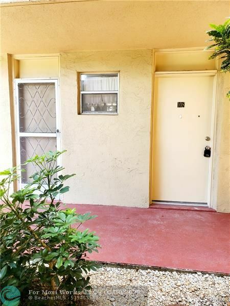 Property Photo:  406 NW 68th Ave 108  FL 33317 