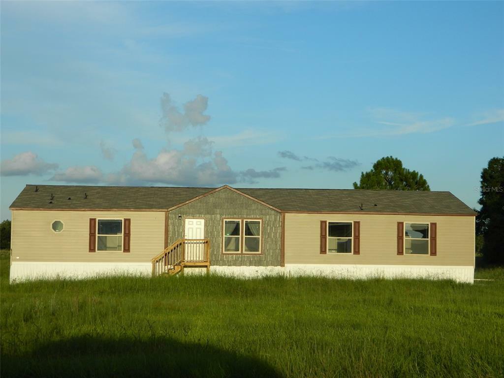 Property Photo:  5966 NE Cubitis Avenue  FL 34266 