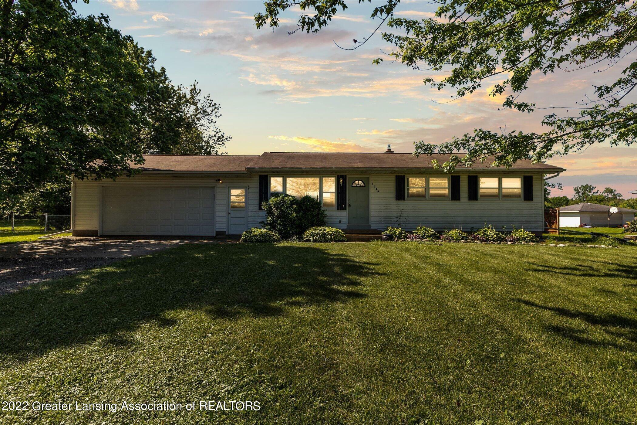 Property Photo:  1079 W Kinsel Highway  MI 48813 