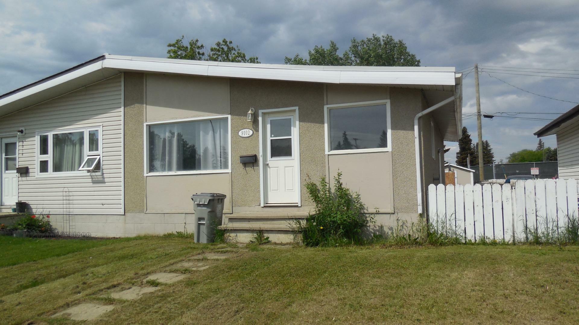Property Photo: 9102 100 Street AB T8V 2K5