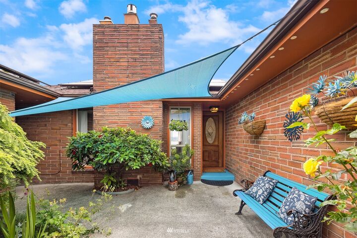 Property Photo:  10824 Forest Avenue S  WA 98178 