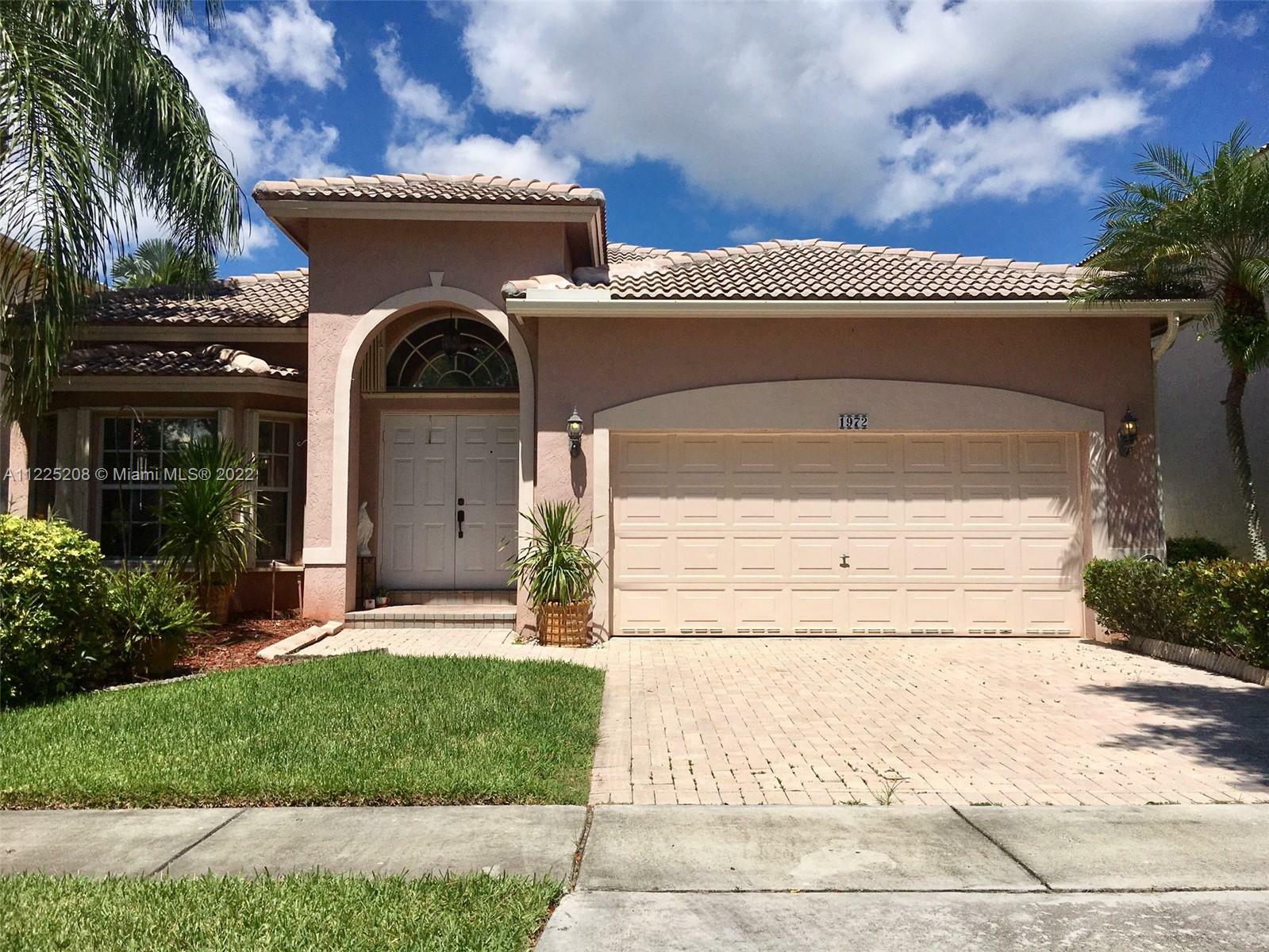 Property Photo:  1972 NW 170th Ter  FL 33028 