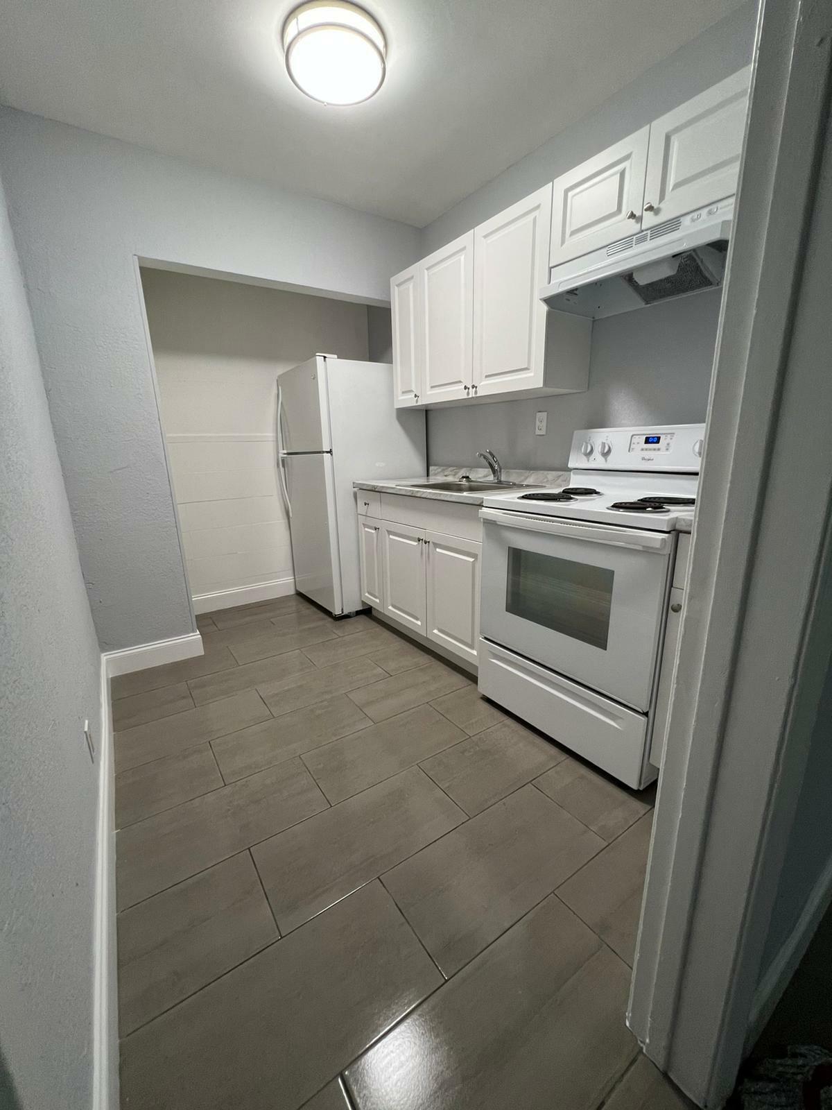 Property Photo:  440 NE 30th Street 2A  FL 33064 