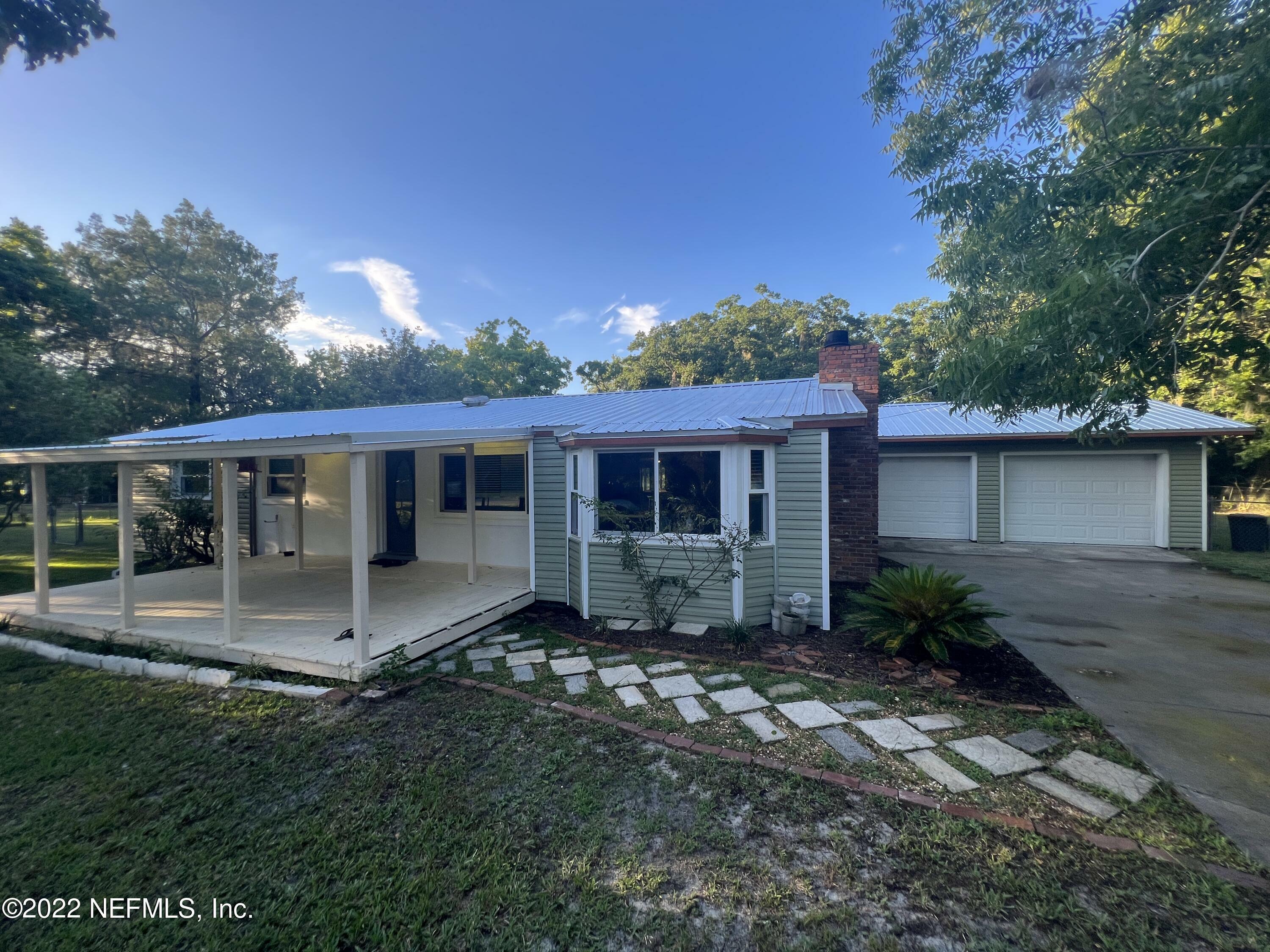 Property Photo:  3410 Raulerson Road  FL 32092 