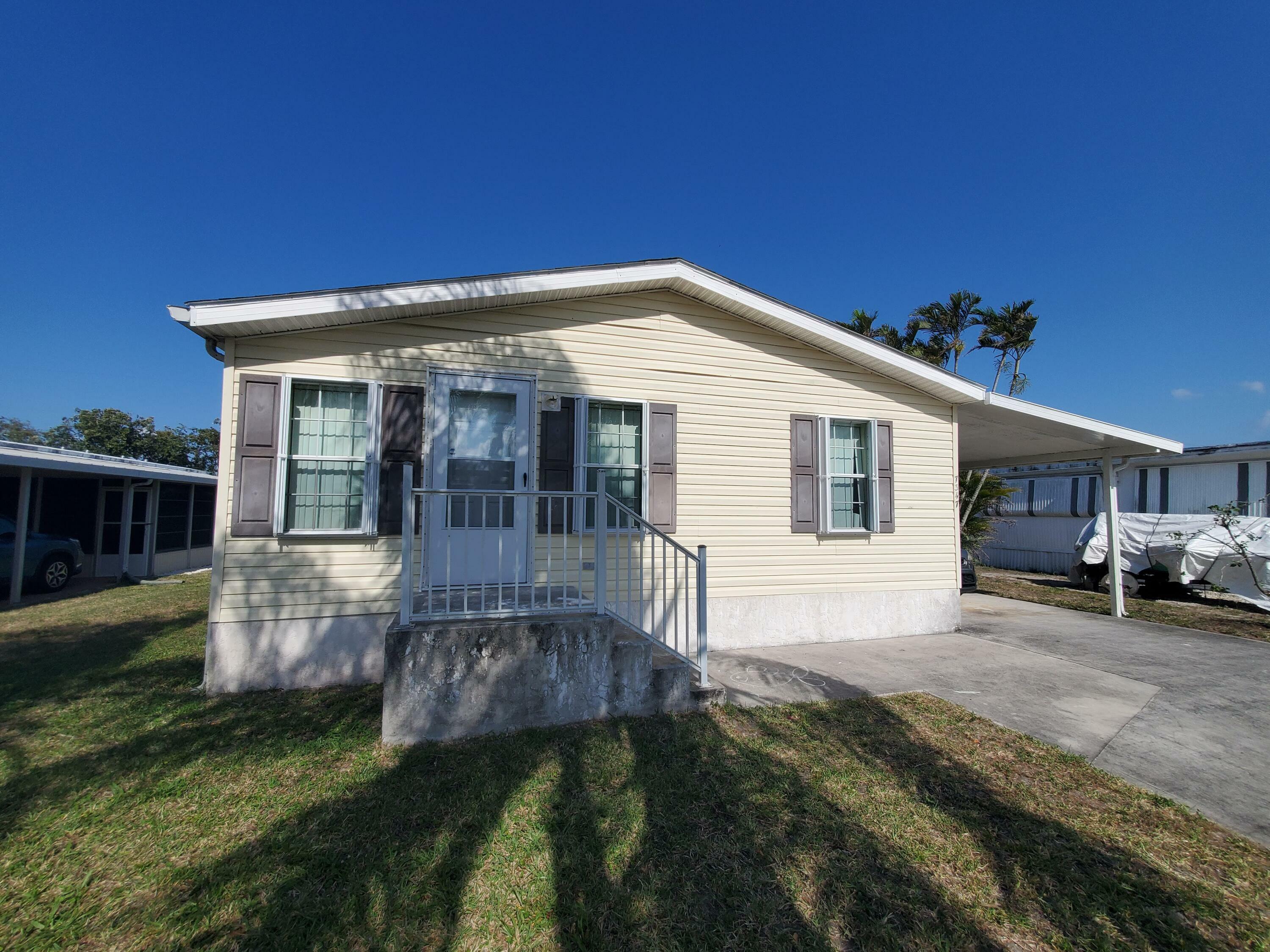 Property Photo:  7347 SE Swan Avenue  FL 33455 