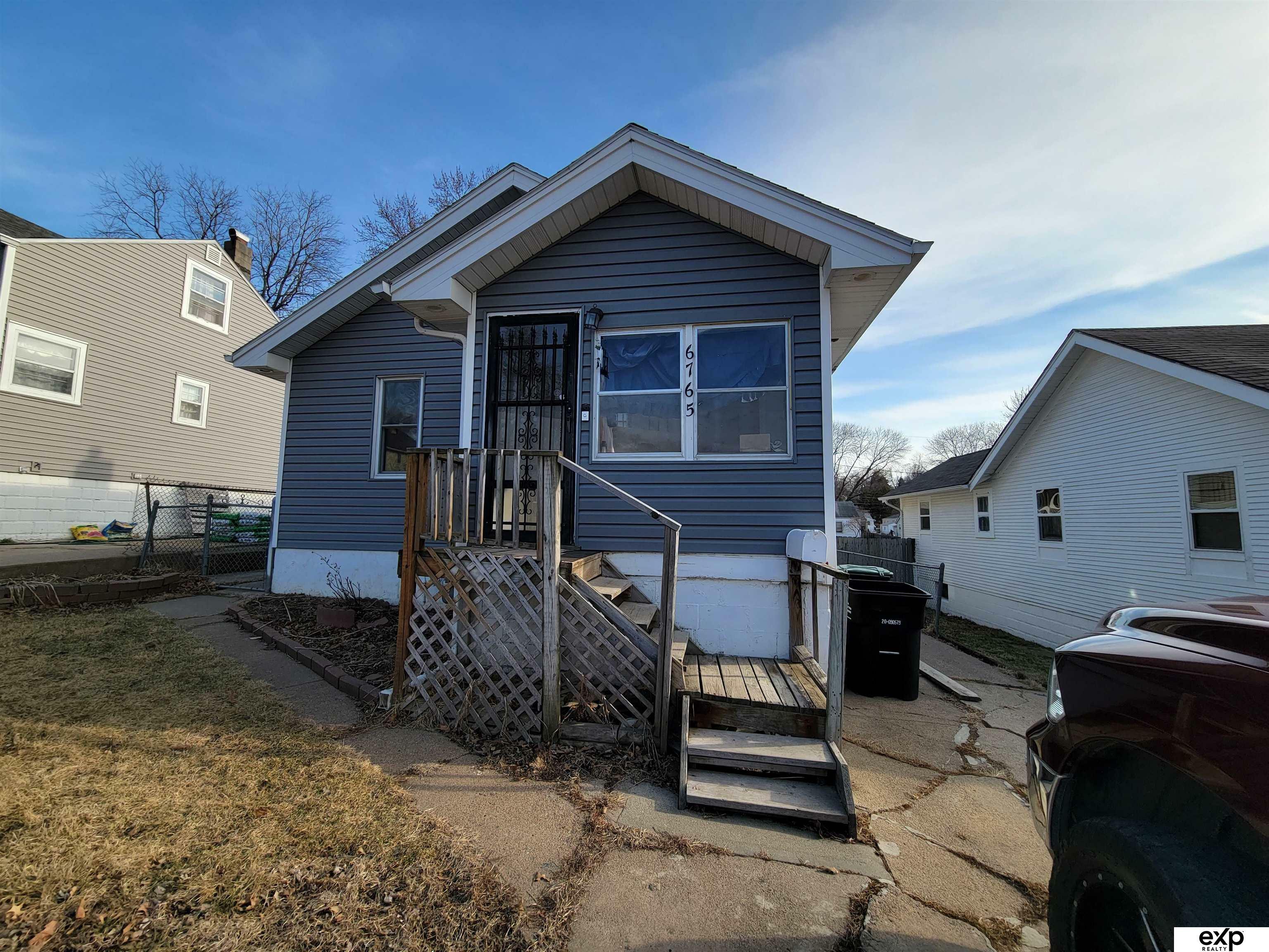 Property Photo:  6765 Pratt  NE 68104 