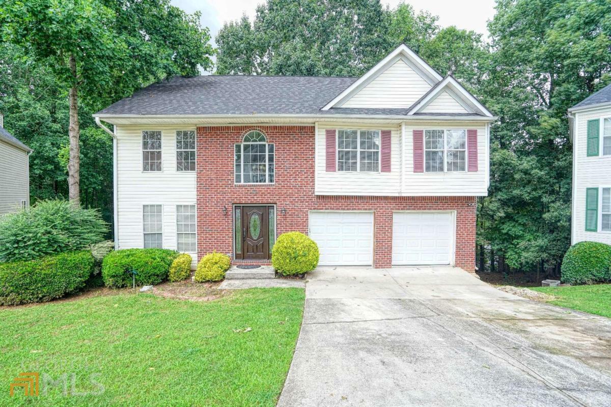 Property Photo: 6977 Magnolia Park Drive GA 30093