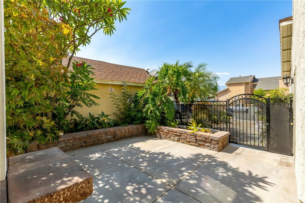 Property Photo:  14417 El Contento Avenue  CA 92337 