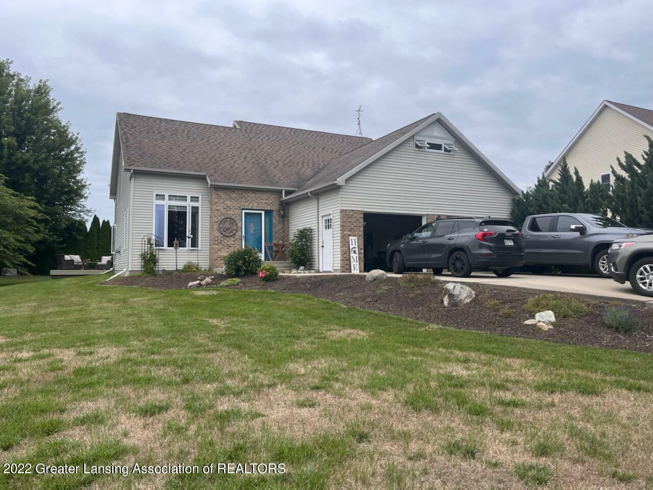 Property Photo:  1041 S Clubhouse Drive  MI 48893 