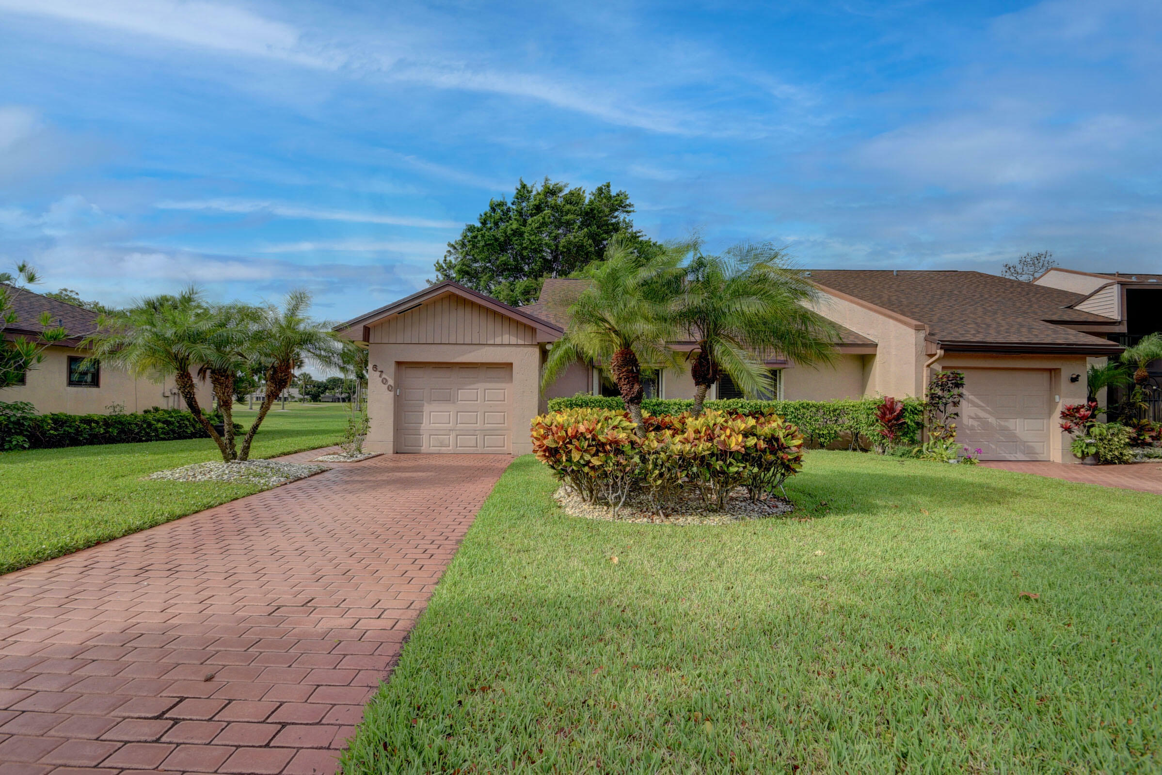 Property Photo:  6700 Versailles Court  FL 33467 