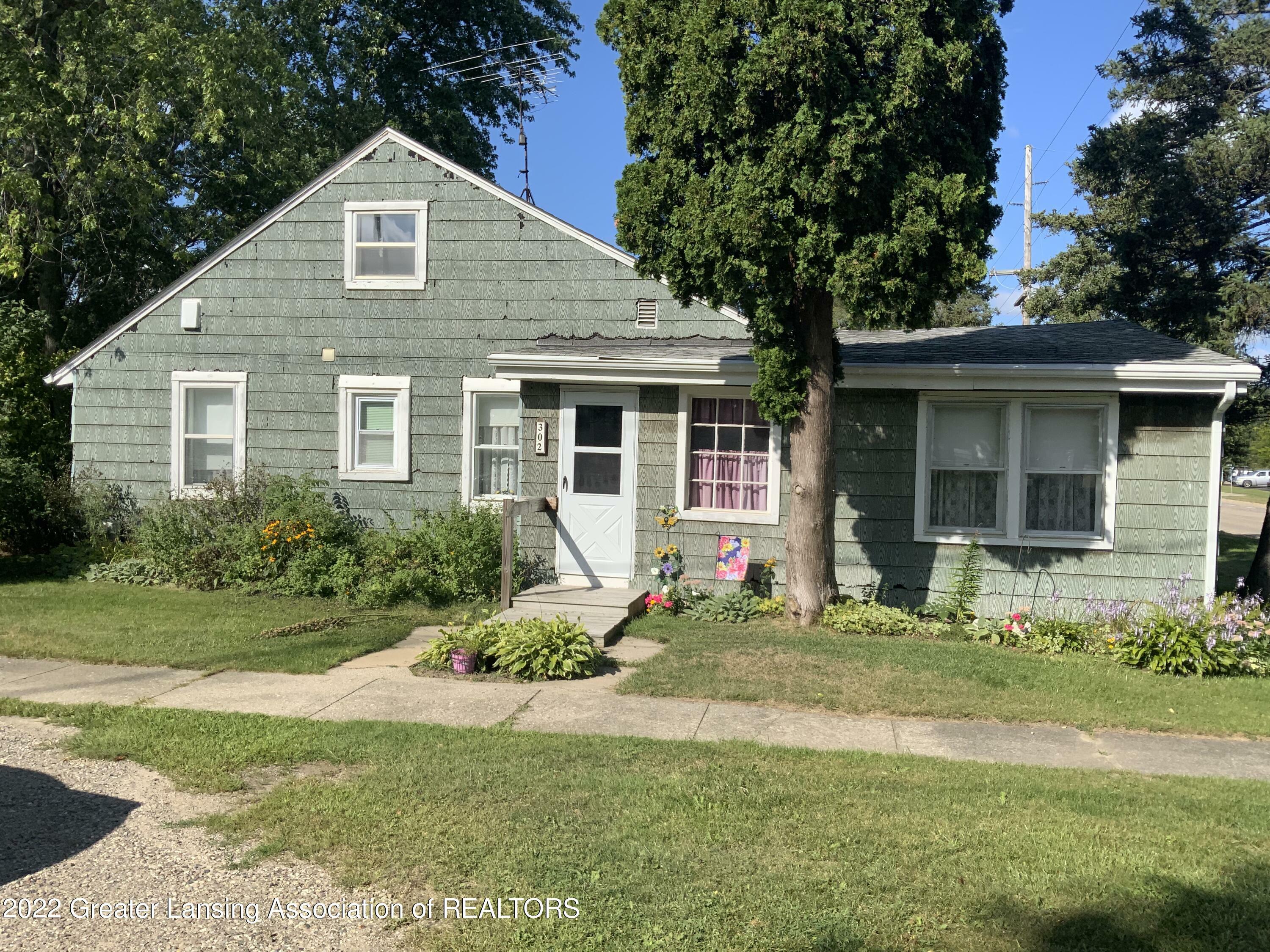 Property Photo:  302 Free Street  MI 48836 