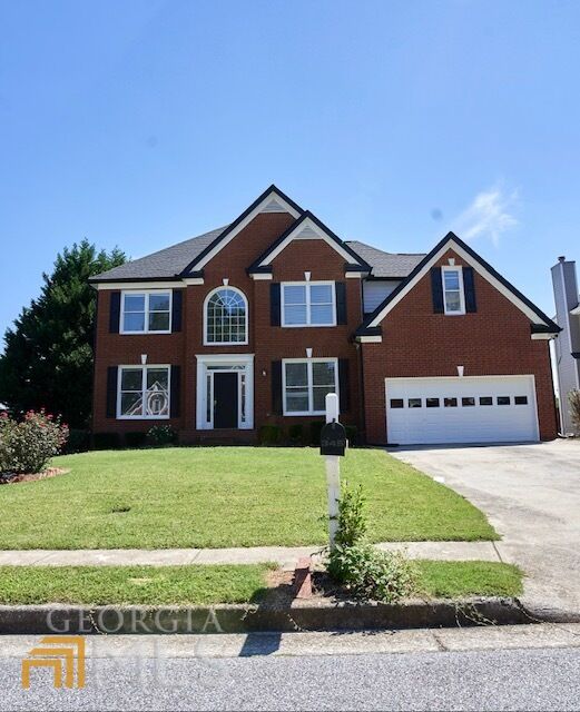 Property Photo: 345 High Hardin Way GA 30043