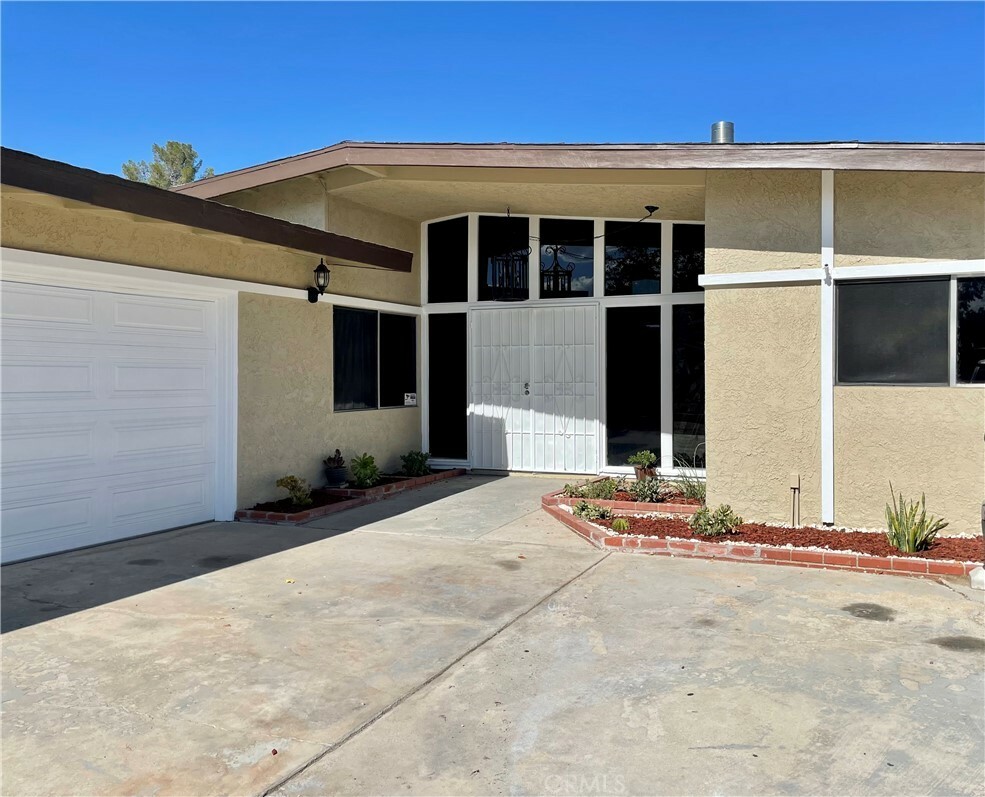 Property Photo: 14157 Wimbleton Drive CA 92395
